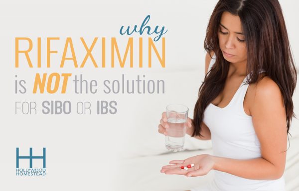 Woman with IBS looking at Rifaximin supplements 
