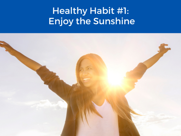person enjoying the sunshine with the title "healthy habit #1: enjoy the sunshine" 