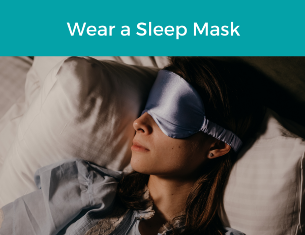 person wearing a sleep mask in bed under the title "Wear a Sleep Mask" 