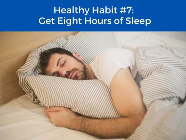 person sleeping with the title "healthy habit #7: get eight hours of sleep"