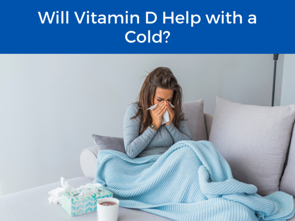 woman wrapped in a blanket sneezing into a tissue under the title "Will Vitamin D Help with a Cold?"  