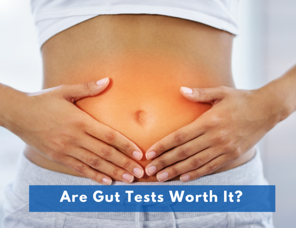 image of a person holding their stomach with their hands over the title "Are Gut Health Tests Worth It" 